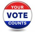 circle with red white and blue pattern and the text from top to bottom reading "Your Vote Counts"