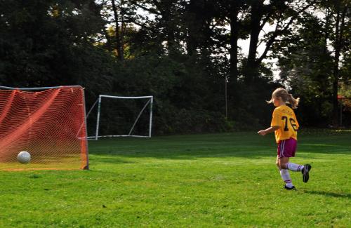 Soccer Player shooting for a goal