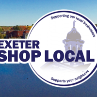 backdrop aerial photo of the Exeter skyline with river in foreground with the words Exeter Shop Local over it.