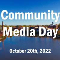 aerial photo of the river looking toward Exeter with the words Community Media Day October 20th, 2022 over the water and sky