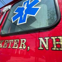 side of fire truck showing medical symbol