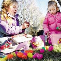 Girls searching for Easter eggs