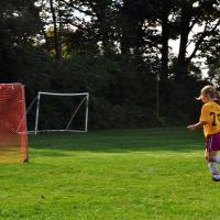 Soccer Player shooting for a goal