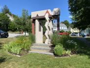 Founders park sculpture with flowers