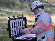 a fire chief sets up tests