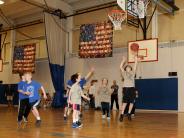 Child Playing Basketball