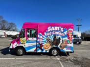 Sam's ice cream in a parking lot