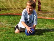 Goalie stopping the ball