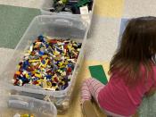 Girl creating with LEGO's