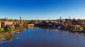 An aerial photograph looking over the Squamscott River towards downtown Exeter