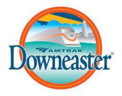 logo for amtrak downeaster with train inside of an orange circle with blue letters