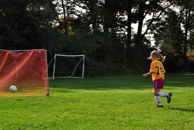 Soccer Player shooting for a goal