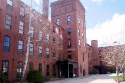A large brick building located on 156 Front Street